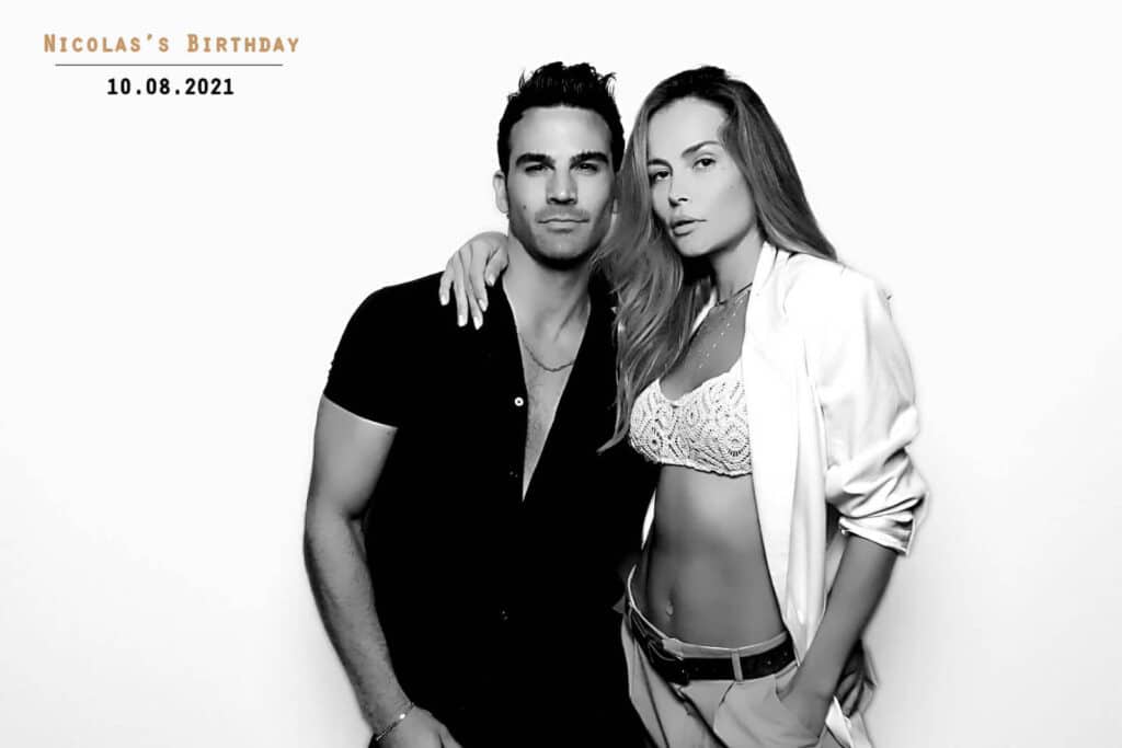 man and woman posing at beauty booth in LA for nicoles birthday