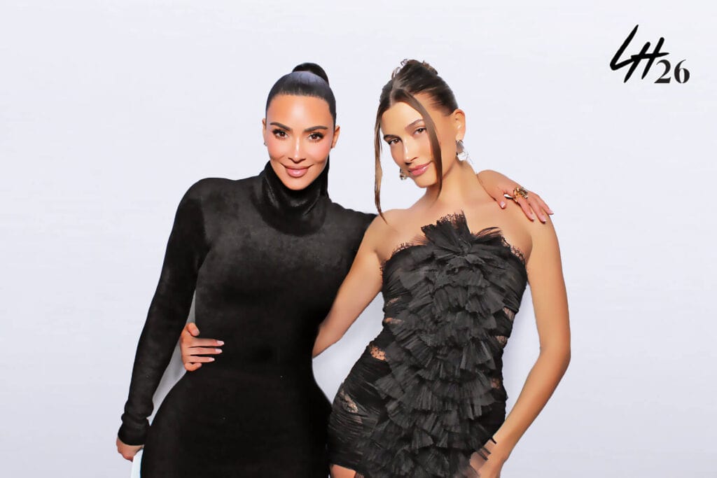 Guests posing for a polished beauty and glam photo booth portrait
